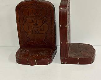 353 pairofembossedleatherfiguralbookend