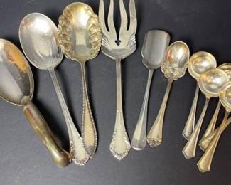 593 assortedsilverplatedservingutensils