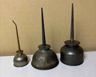 300 threevintagemetaloilcans