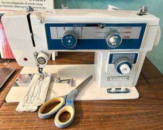 Modern fold down Japanese cabinet sewing machine model #: 156B B 1598  $100