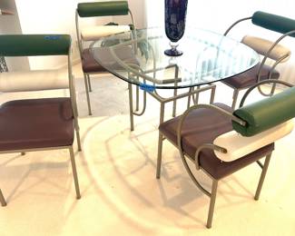 42” rnd x 28”h Glass top Dining Table,  metal base $145; complete 5 piece set, with 4 Chairs w/ rolled back support purple, white & sage; metal arms & legs; 18” seat to floor. $600