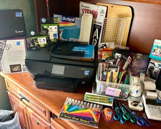 Office supplies. Printer HP Envy model 7640 $50 Bushnell binoculars $25; digital photo frame $15