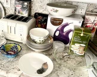 White toaster $10; Pyrex clear handled bowl $10; Rachel Ray oil & Vinegar set NIB $30