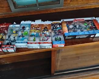 Metal figures from Disney lots of Disney stuff including lithographs
