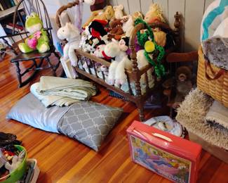 Pillows, old rocker crib needs work, lots of barbie cases & barbies