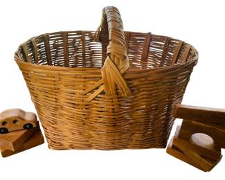 Large Rattan Basket With Handle Filled With Vintage Wooden Building Blocks