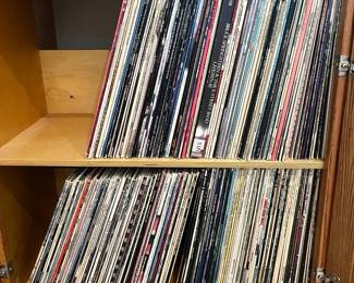 cs- Large collection of vintage vinyl LP records spanning primarily the 1960s through 1980s, with a wide variety of rock, pop, folk, easy listening, country, classical and movie soundtrack recordings. Collection appears to contain well over 100 albums. Artists and titles visible include The Beatles Abbey Road, Michael Jackson Thriller, Eagles Their Greatest Hits, Fleetwood Mac, Steely Dan, Billy Joel, Simon & Garfunkel, Carole King, James Taylor, Neil Diamond, Carly Simon, Paul Simon, The Beach Boys, John Denver, Glen Campbell, Willie Nelson, The Carpenters, Frank Sinatra, Rod Stewart and others. Soundtracks include Top Gun and The Graduate, along with additional assorted recordings. Records and jackets are in varying pre-owned condition with expected age-related wear. Records have not been individually inspected or play-tested. Please review photos for artists, titles and overall condition. Entire collection sells together as one lot.