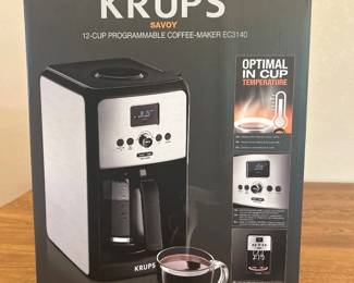 jk- The KRUPS Savoy EC3140 is a 12-cup programmable coffee maker designed for optimal brewing performance. Featuring a sleek black and stainless steel exterior, this coffee maker combines modern aesthetics with durable materials. It boasts programmable settings with an easy-to-read digital display, allowing you to customize brew time and strength. The machine ensures optimal in-cup temperature for the perfect cup every time and includes an anti-drip system for mess-free pouring. Compact yet capable, it is ideal for household use, backed by a 2-year international warranty.