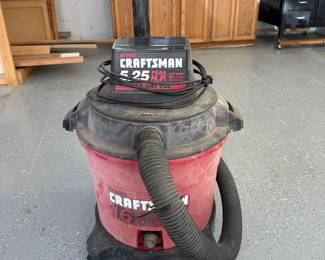 mj- This Craftsman wet/dry vacuum cleaner features a powerful 5.25 peak horsepower motor capable of handling tough cleaning tasks. Designed with a large 8 gallon tank, it is suitable for both wet and dry debris, making it ideal for workshop or household use. The vacuum includes multiple hose attachments and a robust, durable construction with a black top and wheels for easy mobility.