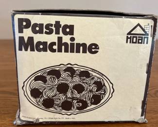 jh- This vintage Hoan Pasta Machine is a durable and efficient kitchen tool designed for creating perfect homemade spaghetti. Made in Italy, it features a heavy-duty construction and a 7-thickness adjustment for customizable pasta results. The machine is simple to use, safe, and easy to clean, ideal for both beginners and experienced cooks. The box measures approximately 8 inches by 6 inches, highlighting its compact size for convenient storage. Included are detailed instructions to help you get started with effortless pasta making at home.