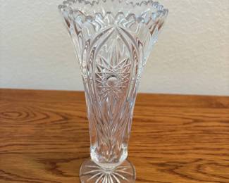 fl- This exquisite Nachtmann Bleikristall Florence Vase stands 8.5 inches tall and showcases stunning intricate cut glass patterns typical of fine lead crystal craftsmanship. The clear crystal vase features a scalloped rim and detailed floral and geometric designs that reflect light beautifully, making it a perfect decorative piece. Its elegant shape and brilliant clarity highlight the premium quality lead crystal material, ideal for both display and floral arrangements.