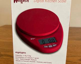 jd- This Weigh'n Digital Kitchen Scale features a vibrant red color and compact design, perfect for precise kitchen measurements. It has a capacity of 11 lb / 5 kg with increments as fine as 0.1 ounce / 1 gram. The scale includes a convenient tare 'Add & Weigh' function and can measure in ounces, pounds + ounces, and grams. Powered by 2 AAA batteries (included) and comes with a product manual. Ideal for accurate weighing of ingredients with a clear digital display.
