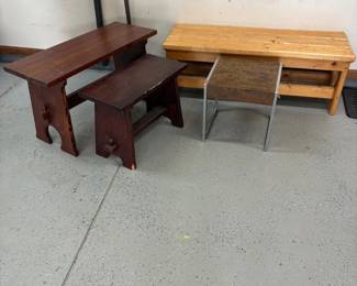 hm- This collection features a variety of wooden benches and end tables, each with unique dimensions and distinct wood finishes. The set includes benches sized 17.5" x 48" x 16.5", 20.5" x 35.5" x 14.5", and 17.5" x 24" x 12", as well as an end table measuring 16" x 16" x 15.5". The benches showcase warm natural wood tones, with one bench featuring a charming heart-shaped cutout on its side, adding a decorative and rustic touch. The end table combines metallic legs with a wooden block-patterned top, offering a contemporary contrast to the wooden benches. Ideal for diverse decor styles, this assortment highlights craftsmanship and varied wood textures.