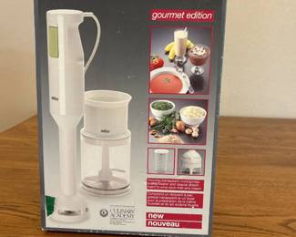 jb- Experience versatile and efficient food preparation with the Braun Hand Blender and Chopper MR 380, Gourmet Edition. This compact system features a powerful hand blender and a convenient chopper attachment, perfect for chopping, blending, and pureeing a variety of ingredients. Designed with easy-to-clean components and ergonomic controls, it offers a comfortable user experience. Highlighted in a sleek white finish, this set is ideal for creating smoothies, sauces, dips, and more, combining functionality and style to elevate your kitchen tasks.