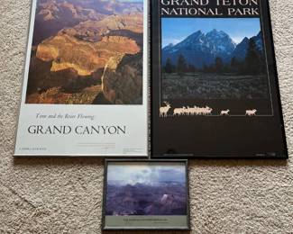 ef- This collection includes a 1968 Sierra Club book-style print titled 'Time and the River Flowing: Grand Canyon,' featuring a stunning aerial view of the canyon with warm earthy tones, framed in a sleek silver frame. Accompanying it is a limited edition 'Grand Teton National Park' print numbered 1479 out of 2000, signed by artist Carl Schreier, showcasing the majestic mountain peaks with a deep blue and black color scheme, bordered by silhouettes of mountain wildlife in a black frame. Also included is a smaller framed photograph by Tom Bean of the Grand Canyon with the quote 'I am ten thousand cathedral ribbed into one,' highlighting the natural grandeur of the landscape in muted purples and greys. These pieces are ideal for collectors or nature enthusiasts looking to add historical and artistic value to their decor. Larger Frames: 37in x 24.5in Smaller Frame: 12in x 15in