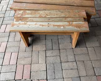 ie- This set includes two rustic outdoor benches made from sturdy wood, featuring a weathered finish that enhances their natural charm. Bench 1 measures approximately 36 inches wide by 18 in high by 13.5 in deep. Bench 2 is 47 inches wide, 17 in high inches deep, and 17.5 inches deep. These benches are perfect for garden or patio use, providing durable seating with a simple yet functional design. The warm wood tone and solid construction make them ideal for adding a cozy, natural element to any outdoor space.