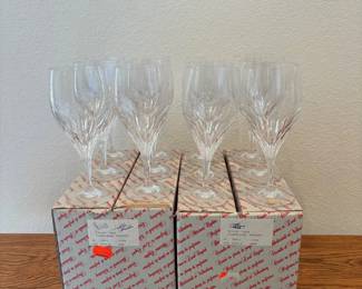 fn- This elegant set of 12 iced tea glasses from Nachtmann Bleikristall Turning Point collection features beautifully crafted crystal with a unique cut design that enhances its brilliance. Each glass stands 8 inches tall, perfect for serving iced tea or other cold beverages in style. The glasses come in their original boxed packaging, showcasing the premium quality and craftsmanship associated with Nachtmann crystal products.