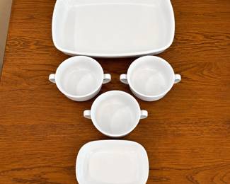 fb- This elegant Williams-Sonoma set features 3 white porcelain soup bowls alongside 6 corning-ware SIDEKICK ceramic side dishes, each measuring approximately 7.5 inches in length and 2 inches in height. The collection also includes an 11-inch porcelain baking dish. Perfect for versatile kitchen use. Crafted from durable porcelain, these pieces spotlight a clean white finish, making them ideal for both everyday dining and special occasions. The compact size of the side dishes complements the nostalgic design of the soup bowls, creating a coordinated and functional addition to your dinnerware.