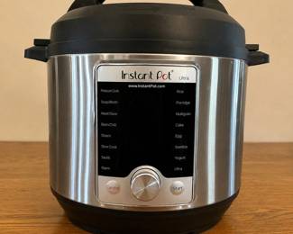 iy- This Instant Pot Ultra is a versatile multi-use pressure cooker designed to simplify cooking with its advanced features. It boasts a sleek stainless steel exterior paired with a digital control panel and a central dial for easy menu navigation. The cooker includes a detachable lid with a steam release valve, a stainless steel cooking pot, and various accessories such as a steam rack, measuring cup, serving spoons, and a power cord. This model is ideal for preparing a wide range of dishes quickly and efficiently while highlighting its sturdy build and user-friendly interface.