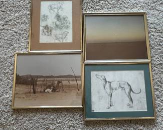 eo- This collection includes four framed art prints, each showcasing distinct artistic themes. The first print features detailed pencil sketches of horses in various poses, highlighted by a brown matte and a gold frame. The second depicts a serene desert landscape with a subtle gradient sky, framed in gold for an elegant finish. The third print captures a peaceful desert scene with a resting dog amidst sparse vegetation, again with a gold frame emphasizing the earthy tones. The fourth showcases a finely rendered pencil drawing of a dog against a muted teal matte, complemented by the gold framing. Each piece is medium-sized, with the combination of neutral and subtle muted colors, pencil and photographic medium, and metallic gold frames creating a cohesive yet diverse aesthetic perfect for art enthusiasts and collectors. Vertical Frame: 10in x 8in Horizontal Frames: 8in x 10in
