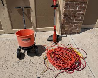 ia- This set includes a Craftsman electric trimmer, perfect for precise lawn edging and trimming tasks. Accompanied by a sturdy orange fertilizer spreader with large wheels for easy maneuverability and adjustable handle height, it ensures efficient distribution of fertilizer or seeds. The set also featuring multiple extension cords making it easy to complete long stretches of trimming.