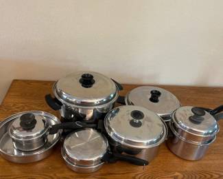 ff- This MultiCore stainless steel pot and pan set includes various sizes ideal for versatile cooking needs. Made from durable stainless steel, the set features a 12-quart large pot measuring approximately 10.5 inches in height and 12 inches in diameter, perfect for soups and stews. Also included is a sizable skillet with a 12-inch diameter, along with smaller pots and pans to accommodate different recipes. Each piece is equipped with black handles and matching lids, combining functionality with a sleek, shiny finish. The set is designed for even heat distribution and long-lasting performance, making it an essential addition to any kitchen.