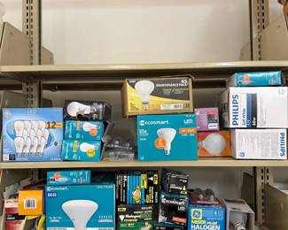 hq- This collection features a variety of light bulbs including LED, halogen, and floodlight types from well-known brands such as Philips and Ecosmart. The bulbs come in different sizes and wattages, suitable for multiple lighting fixtures and needs. The assortment includes both energy-efficient and traditional options.