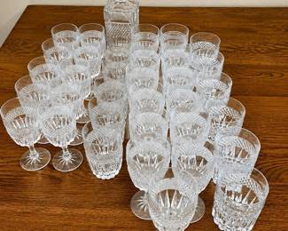 ex- This exquisite Bohemian Crystalex Glasgow glassware set features a stunning diamond cut design, showcasing expert craftsmanship and timeless elegance. The set includes a tall decanter measuring approximately 9 inches in height and multiple crystal glasses varying in size, all featuring intricate cuts that enhance light reflection and create a sparkling effect. Made from high-quality crystal material, this collection highlights clarity, durability, and classic style perfect for any formal gathering or special occasion.
