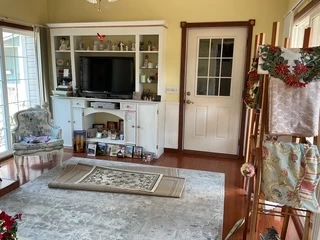 Two area rugs remaining.