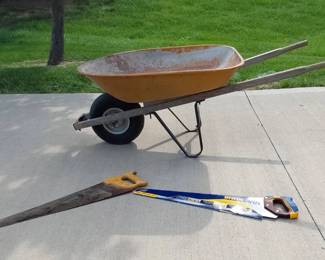 Wheelbarrow And Saws