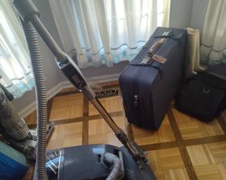 Vintage Vacuum works great and Luggage