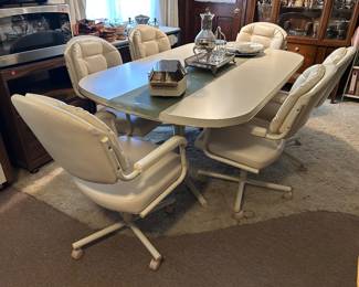 Awesome Mid-Century Modern style  table with1 leaf & 6 CB hairs on castors 