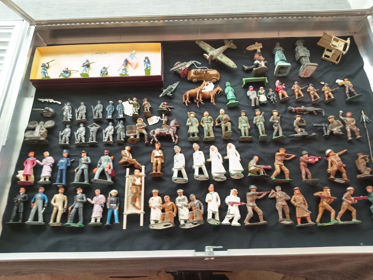 Awesome old cast iron and lead soldiers and figures.  The original 'inaction' figure!