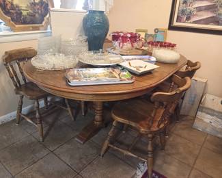 Table with 6 chairs, glass relish trays and a lovely punch bowl