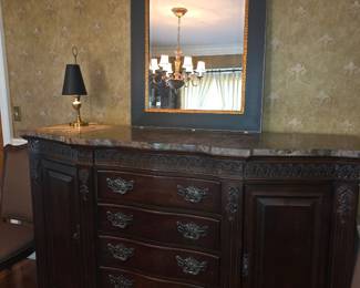 features a dark wood Bernhardt Embassy Row credenza with an ornate marble top and multiple stacked center drawers flanked by cabinet doors