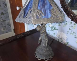 vintage Victorian-style accent table lamp featuring a figural cherub 
