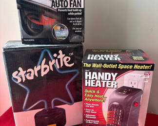 Lot 165: Starbrite Star-Shaped Lamp, Solar Auto Fan, and Handy Heater