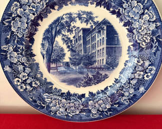 Lot 138: Blue and white decorative plate with Clark University Worcester town scene and floral border
