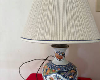 Lot 30: Porcelain floral lamp with pleated shade