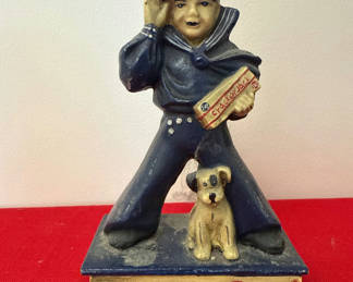 Lot 32: Cracker Jack Sailor and Dog Figurine door stop