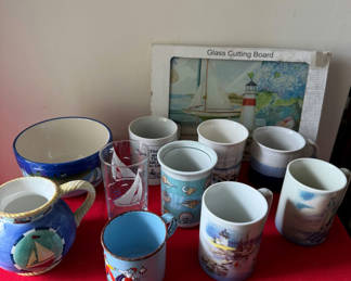 Lot 170: Nautical-themed ceramic mugs and glassware set