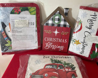 Lot 49: Christmas-themed decorative signs and textiles