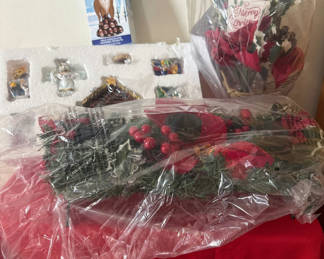 Lot 50: Christmas wreath with berries and accompanying festive bouquet and candy assortment