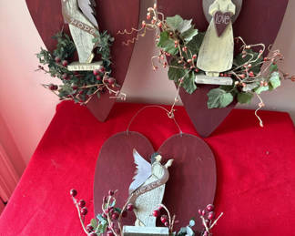 Lot 157: Three rustic wooden heart ornaments with angel figurines