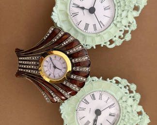 Lot 148: Three ornate decorative clocks