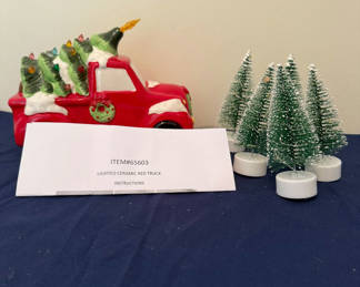 Lot 184: Lighted Ceramic Red Truck with Christmas Tree Load and Mini Bottle-Brush Trees