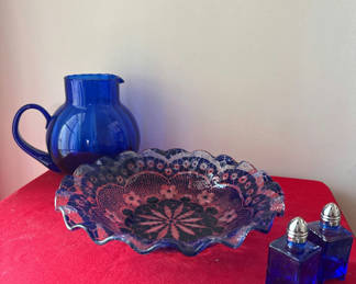 Lot 128: Cobalt blue glass pitcher, decorative bowl, and salt & pepper shakers