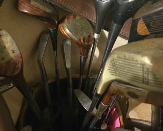 Vintage golf clubs in leather bag