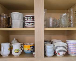 Cabinets are full of useful kitchen wares