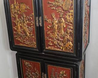 two-tiered Chinese-style lacquer cabinet with gilt embossed scenery (chest-on-chest - two pieces for easy movement))